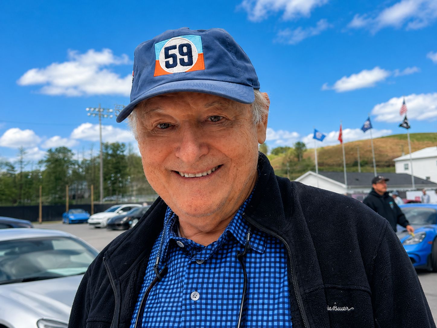 Bruce Burns, owner of Just Sell My Car, at an automotive event